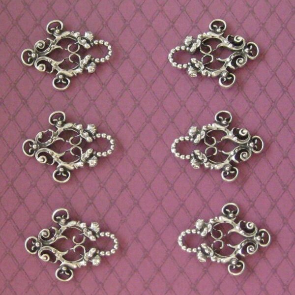 Ornamental Lacing Grommets